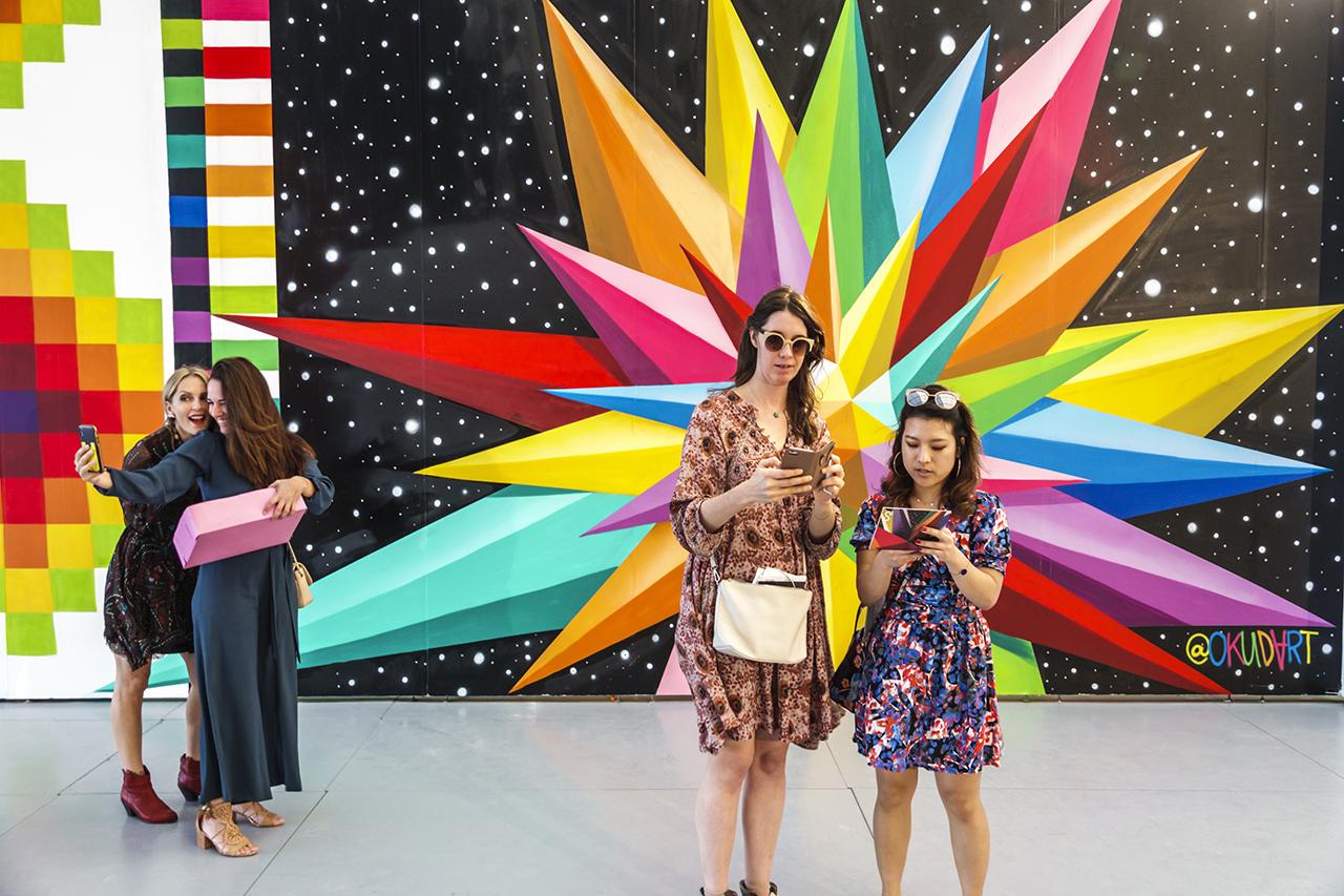 Selfies and social media at a contemporary art show in Miami Beach, Florida, in 2018. (Jeffrey Greenberg/Education Images/Universal Images Group via Getty Images)